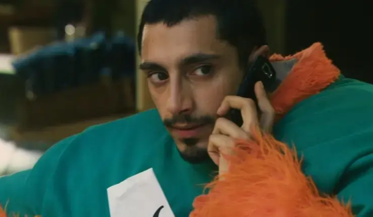 A man listens to someone on the telephone in Four Lions