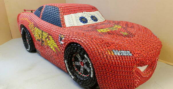 CARS 2: GIANT LIGHTNING MCQUEEN Sculpture Created from1,000’s of CARS 2 Toy Cars