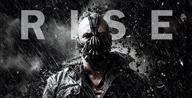 A masked man (Bane) In 'Rise' The Dark Knight Rises Banner