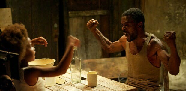 on set during the hushpuppy and wink arm wrestle, camera frame left