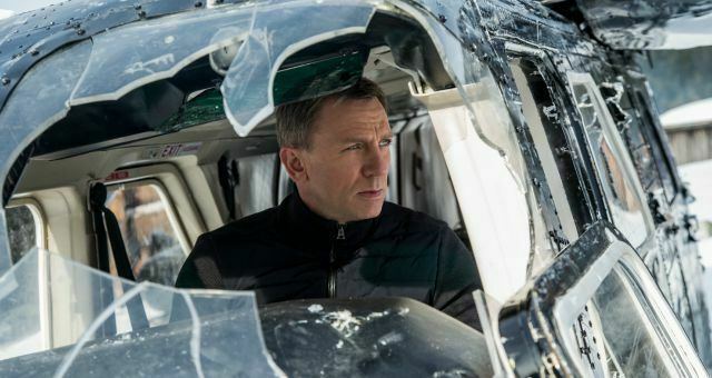 James Bond sits in a helicopter in Spectre