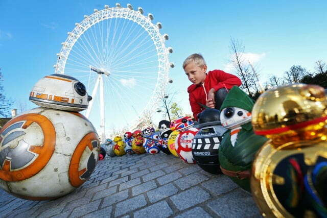 bb-8 From Star Wars: The Force Awakens facing off against some British inspired BB-8 at The London Eye.