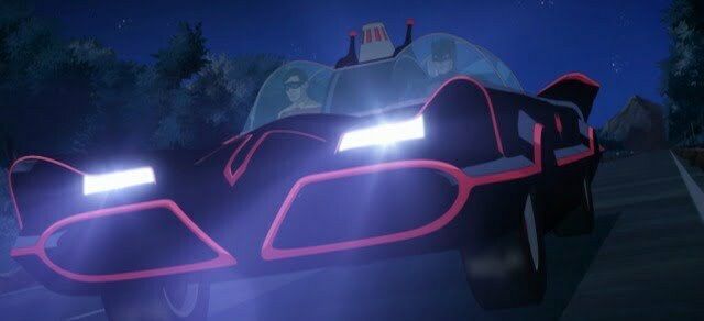 batman driving the bat mobile with Robin