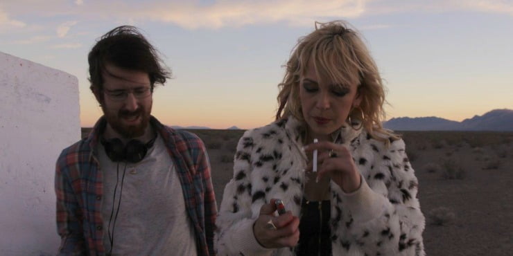 Brittany Allen and director Colin Miniham on the set of It Stains The Sands Red