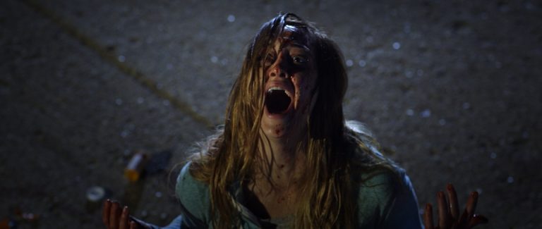 A woman screams in the rain in Ruin Me