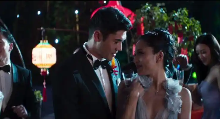An Asian newly wed couple embrace each other Crazy Rich Asians