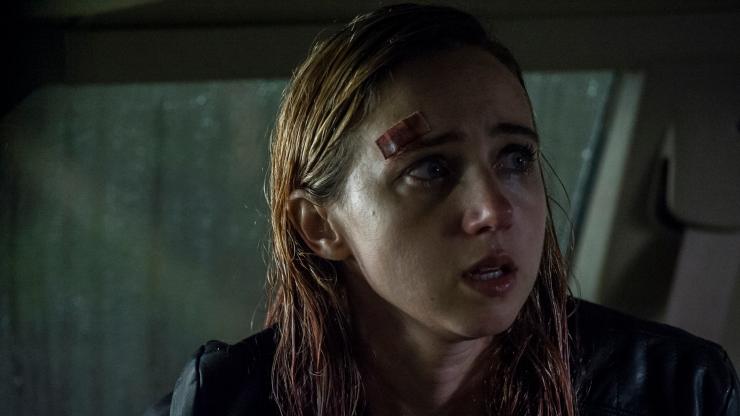A bloodied woman fears something in The Monster hiding in her car