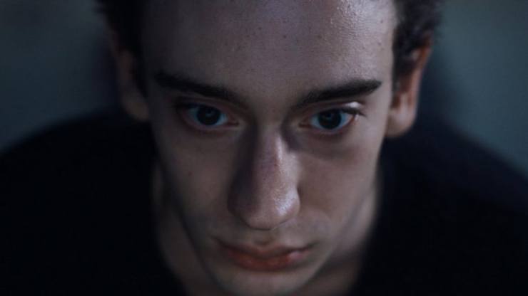 A close up of a young man's face, unhappy in short film Incel