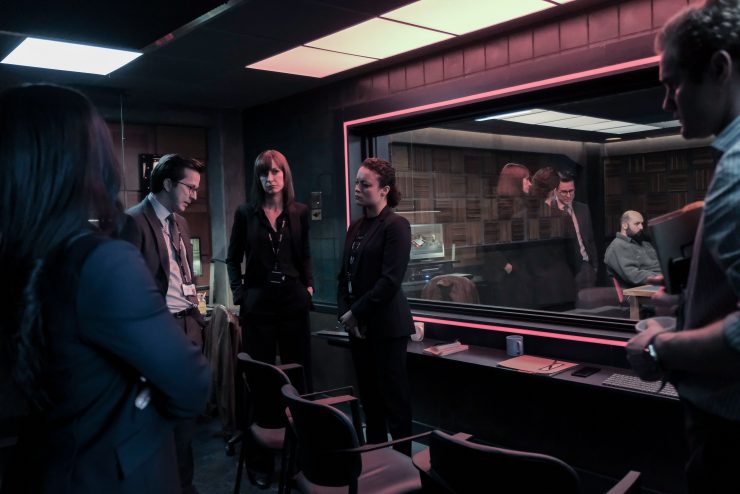 A scene from Criminal: UK The cops discuss