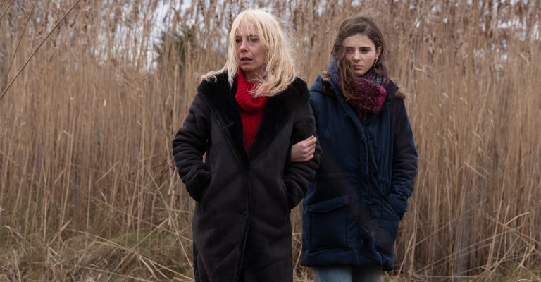 An older woman and younger woman look for something in Lost Girls, now on Netflix read review