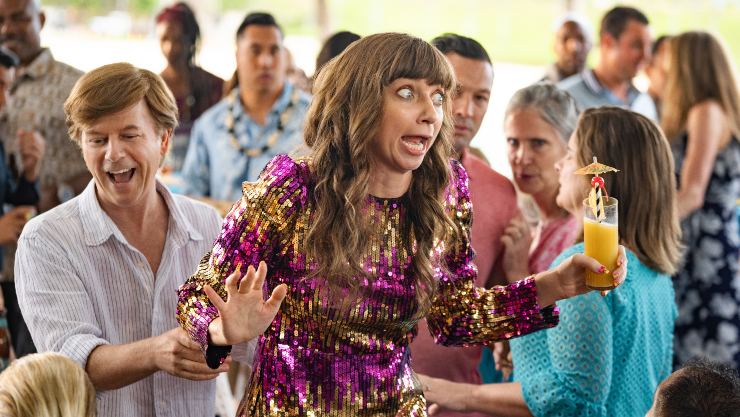 A woman getting irate is held back in The Wrong Missy