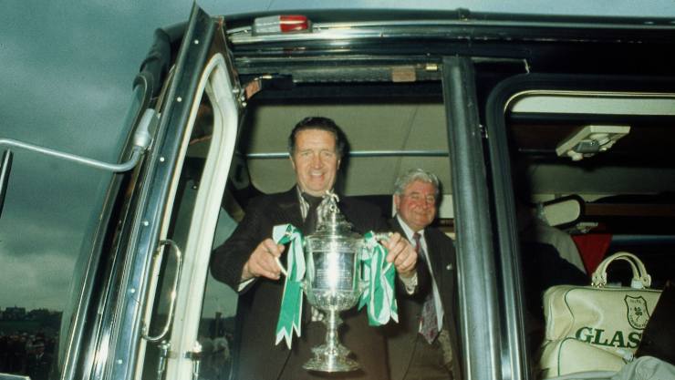 Jock Stein leaves bus with Scottish Cup trophy May 1974