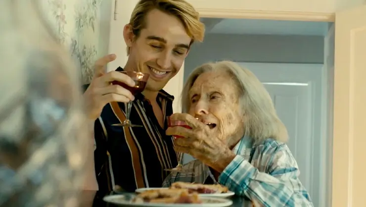 A young man celebrates with his grandmother in Jump, Darling (2021)