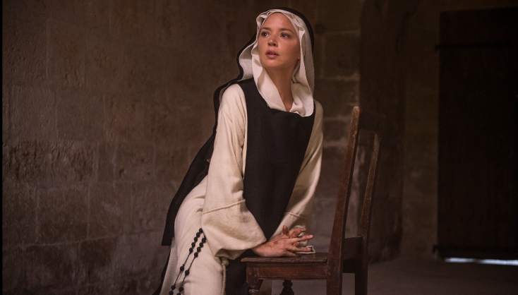 A practicing nun looking for something or someone