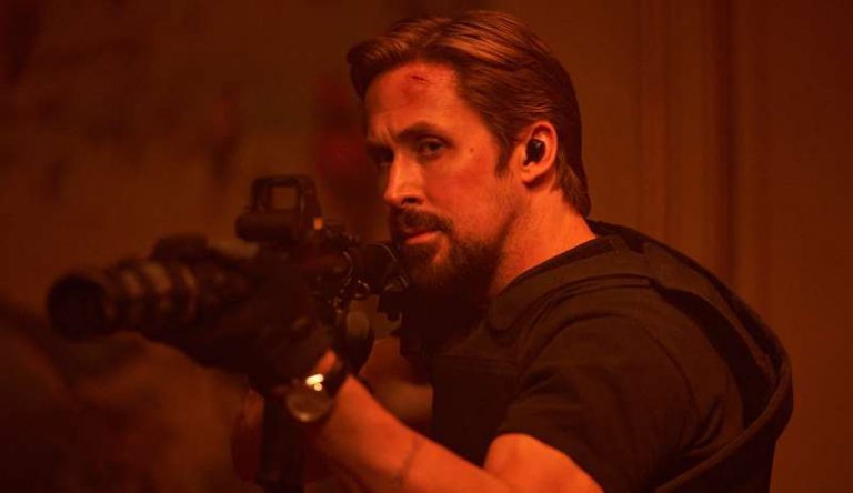 The Gray Man (2022). Ryan Gosling as Six. Cr. Paul Abell/Netflix © 2022