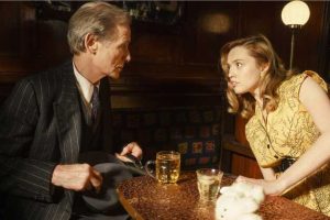 Aimee Lou Wood and Bill Nighy in Living
