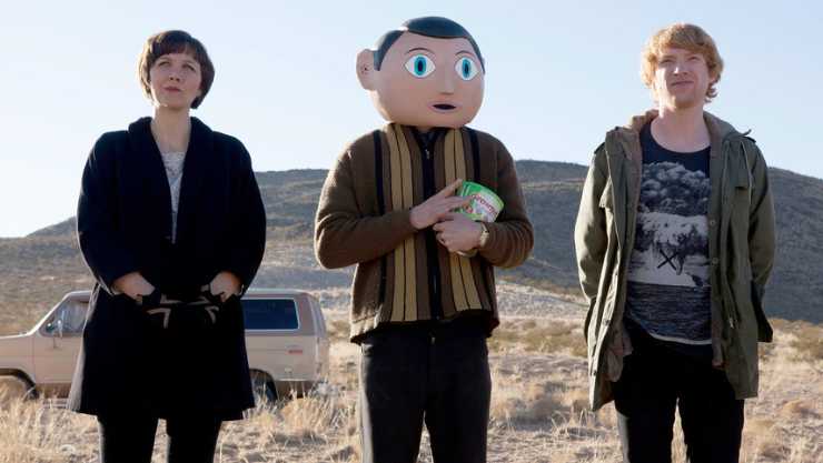 Maggie Gyllenhaal, Michael Fassbender in cardboard mask and Domnhall Gleeson all from Frank coming to MUBI