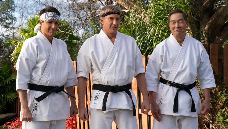 3 men in Karate uniforms ready for a fight