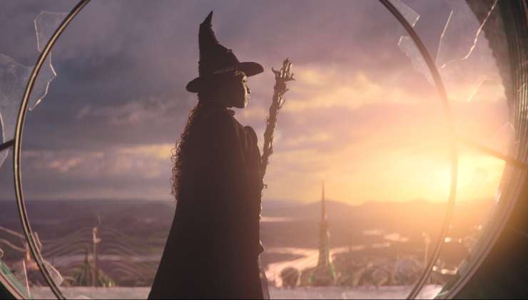 A witch looks out her window, from Wicked