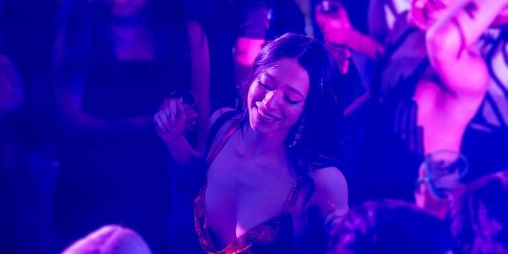 A Woman dancing in a club in Anora
