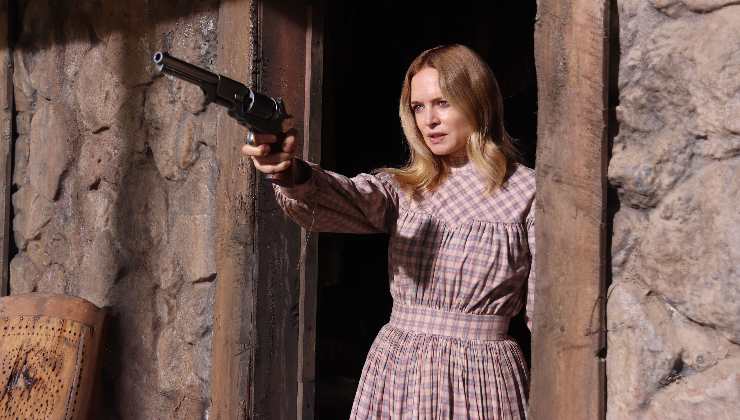An angry woman defends her home with a gun