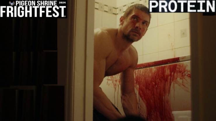Bloodied man looks on