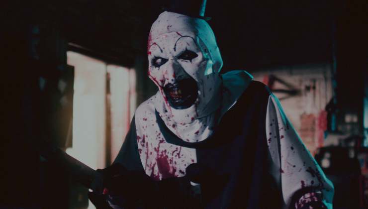 Sadistic clown chilling cold smile