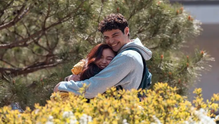 Young man and woman embrace each other in Xo, Kitty Season 2