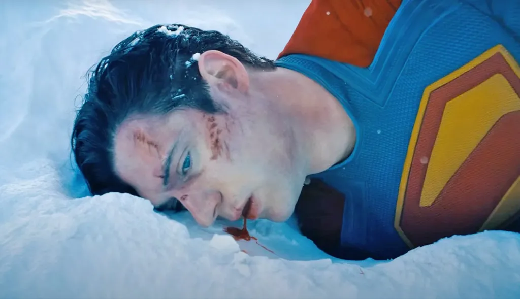 David Corenswet injured in snow in James Gunn's Superman credit to Warner Bros Pictures UK