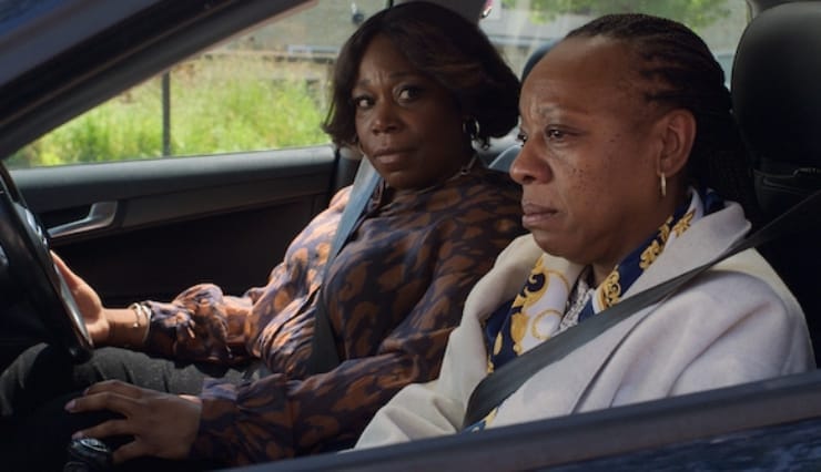2 Women sit in a car looked angry