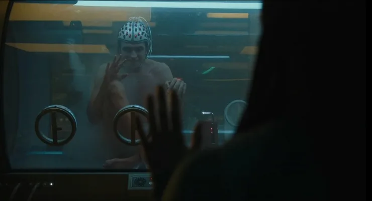 Mickey Barnes in a test tube in Mickey 17