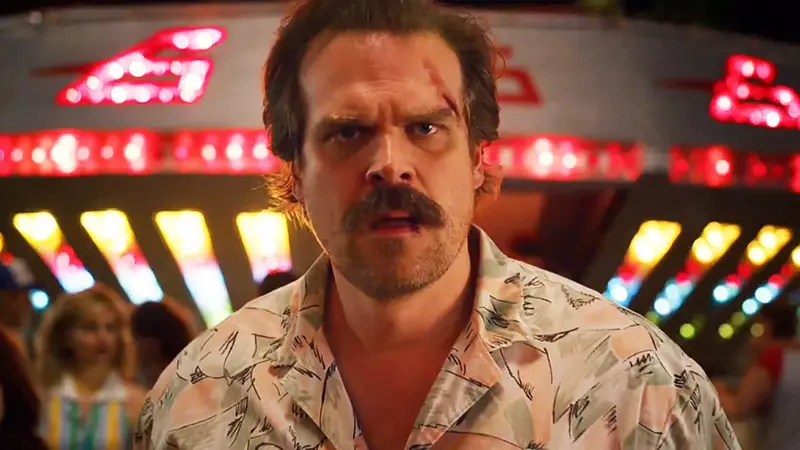 David Harbour as Hopper looks on in Stranger Things