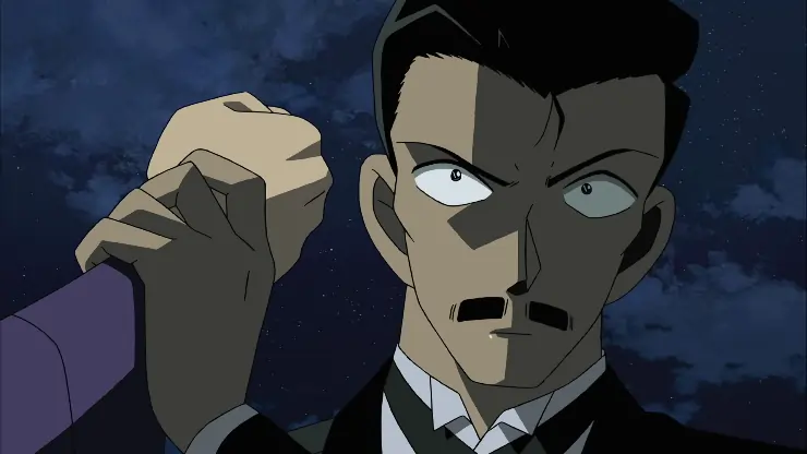 A man stops someone hitting him In Detective Conan -Strategy Above the Depths
