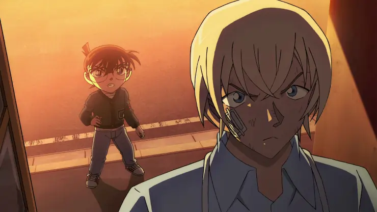 Conan argues with blonde haired man