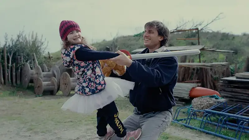 A man and his daughter in Paternal Leave