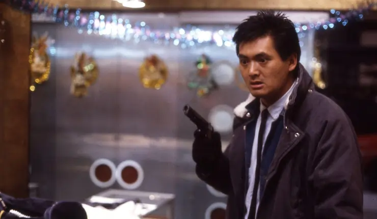 A young Chow Yun Fat with a gun in Ringo Lam's 1987 City On Fire