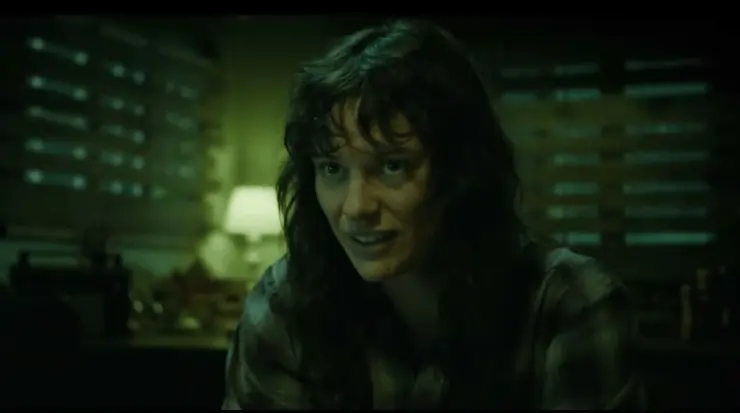 A woman waits in a cabin as the world falls apart in Forgive Us All