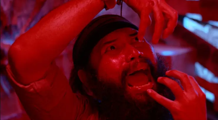 A man screams in the Indonesian horror comedy The Draft!
