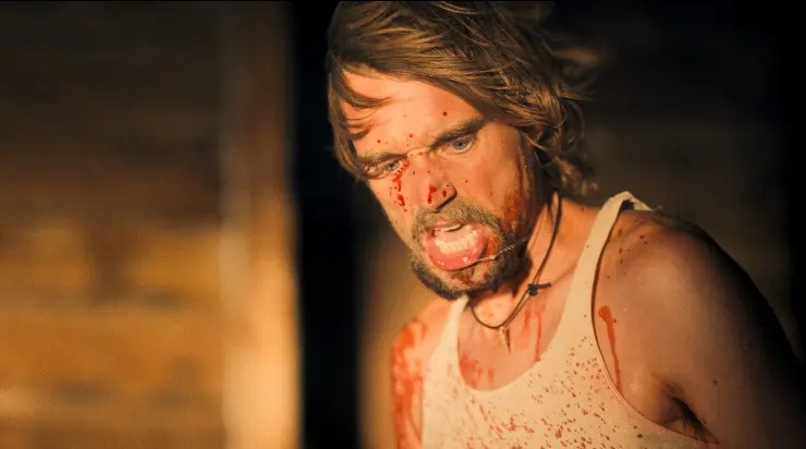 Kai Lennox in A Desert , an angry bloodied man