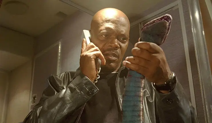 Samuel L Jackson on a phone with a "dead snake" in Snakes On a Plane