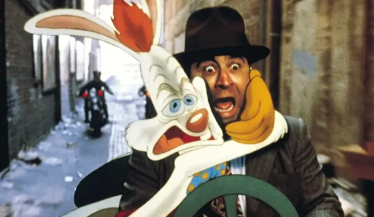 a man and animated rabbit hug in fear in Who Framed Roger Rabbit