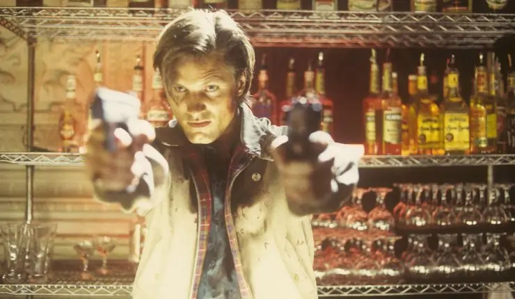 A man stands in a bar in American Yakuza (1993, Viggo Mortensen) Arrow Video.