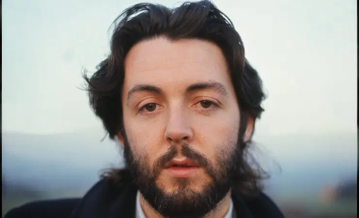 Paul McCartney looking into the camera,