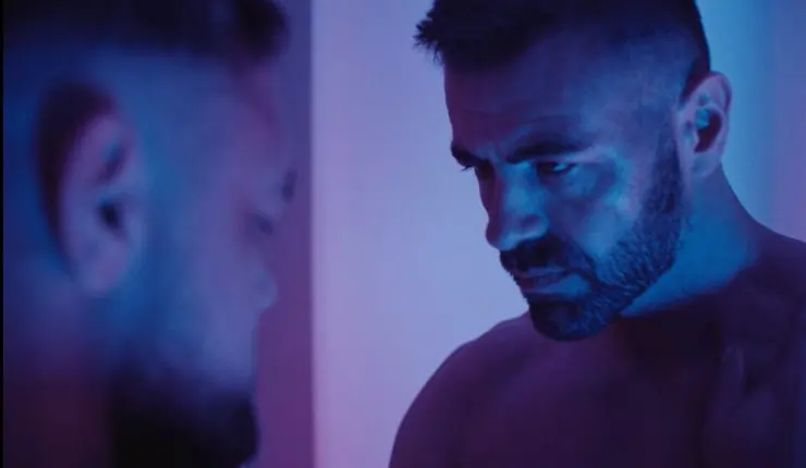 2 men face each other in drama Departures