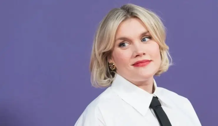 Profile image of Emerald Fennell in shirt and tie