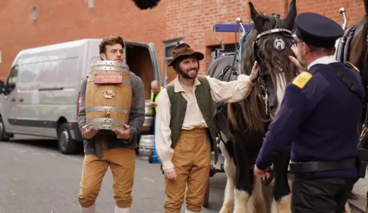 2 men in lederhosen with a barrell with a horse in Mother's Pride