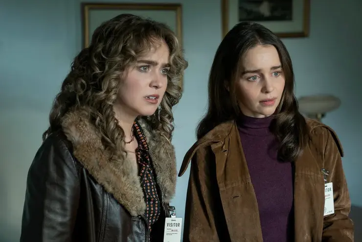 Two women look shocked in Ponies Review