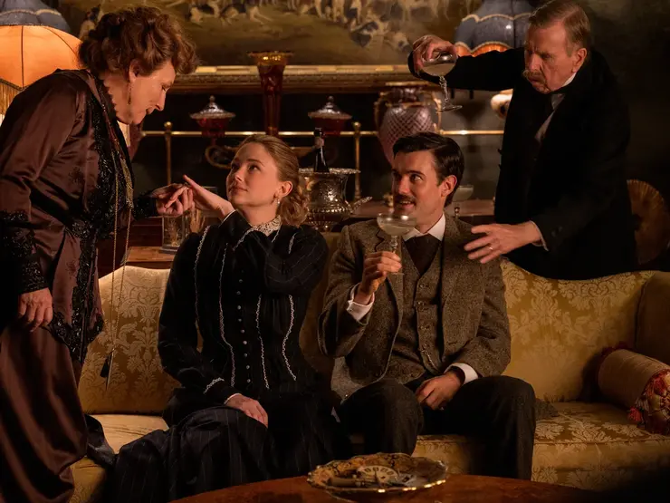 A group of people have a drink in Virginia Woolf's Night and Day