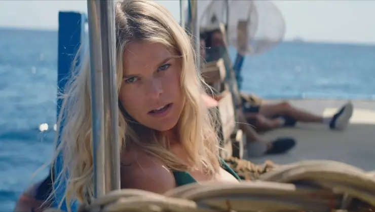 A woman looks determined on a boat in Chum