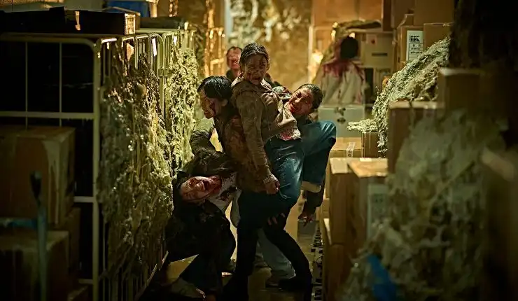 The zombies walk through a building in Colony